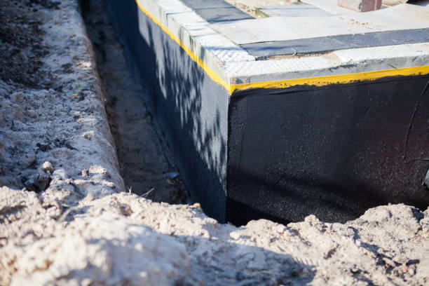 Professional Waterproofing technician working in Red Hill, SC